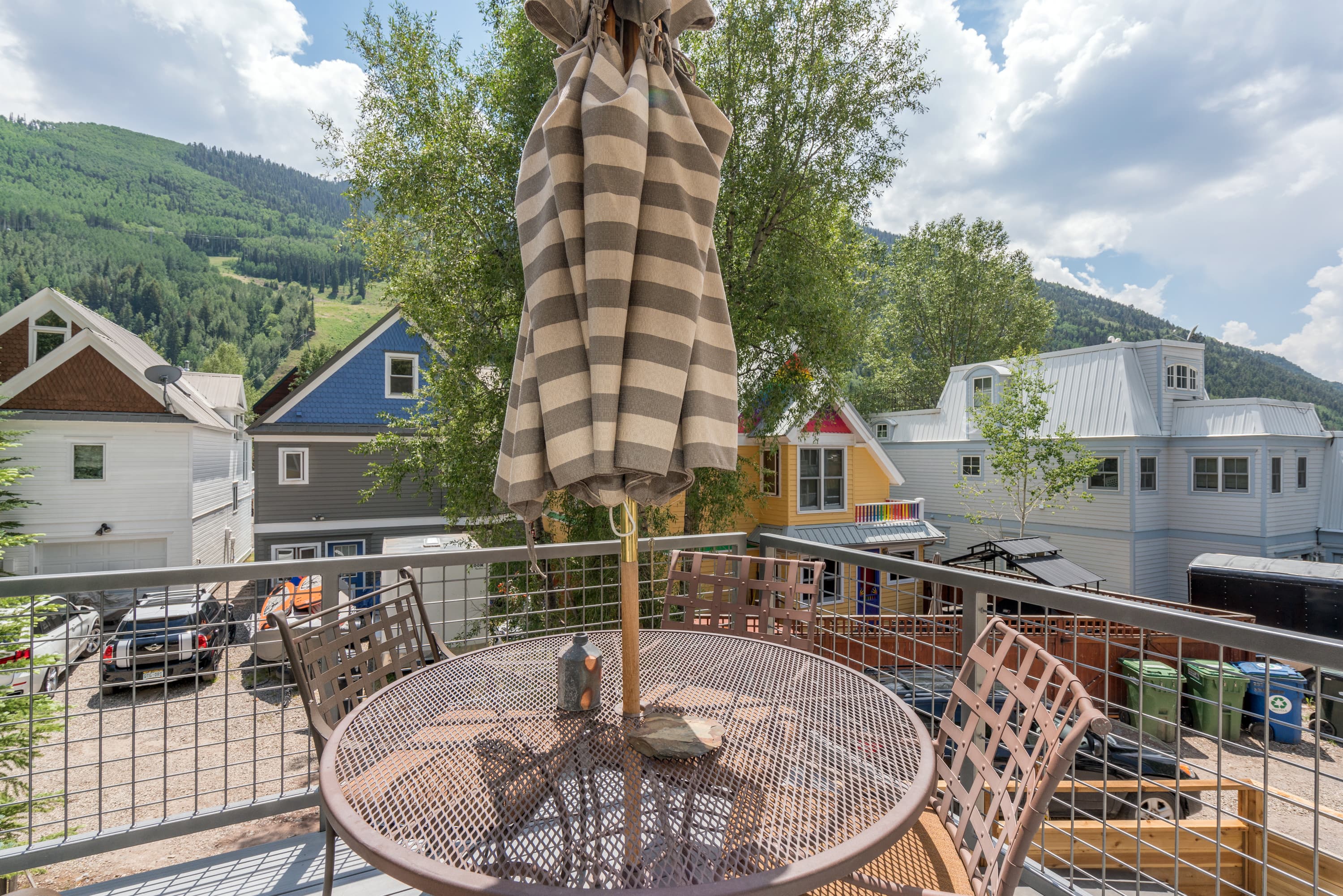 Patio with Seating and Views of the Mountainside at Bachman Village #13