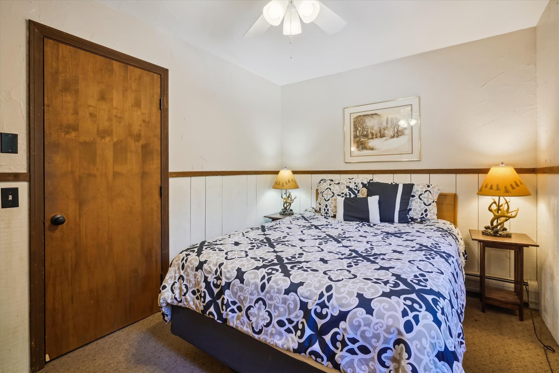 Master bedroom on upper level with queen bed