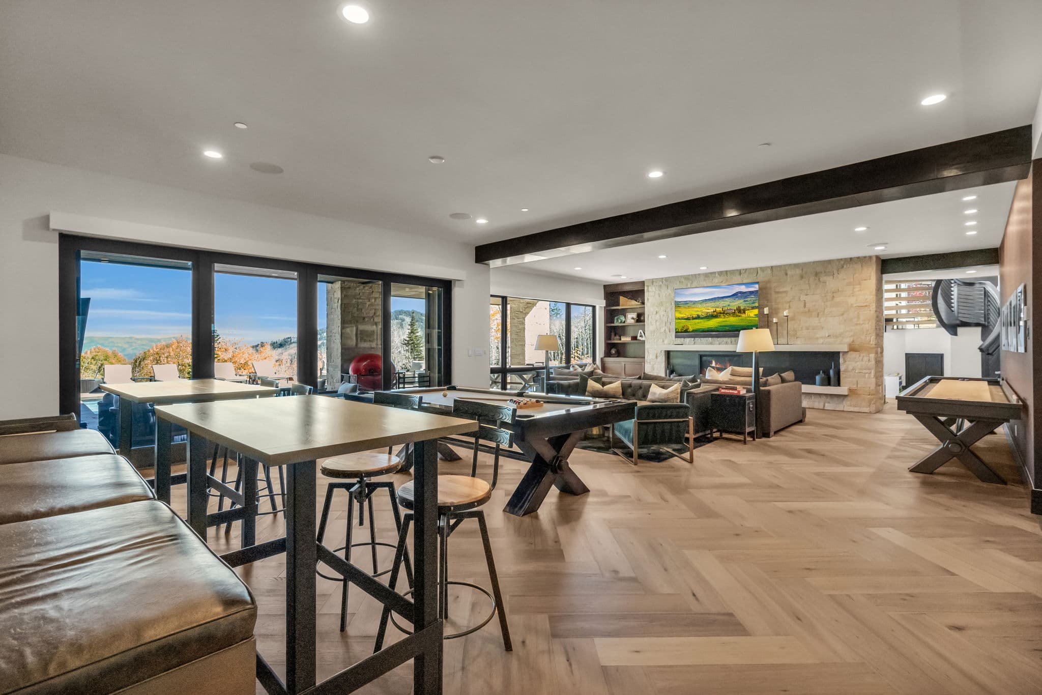Bar Table, Stools, Pool Table and Sliding Doors to the Balcony