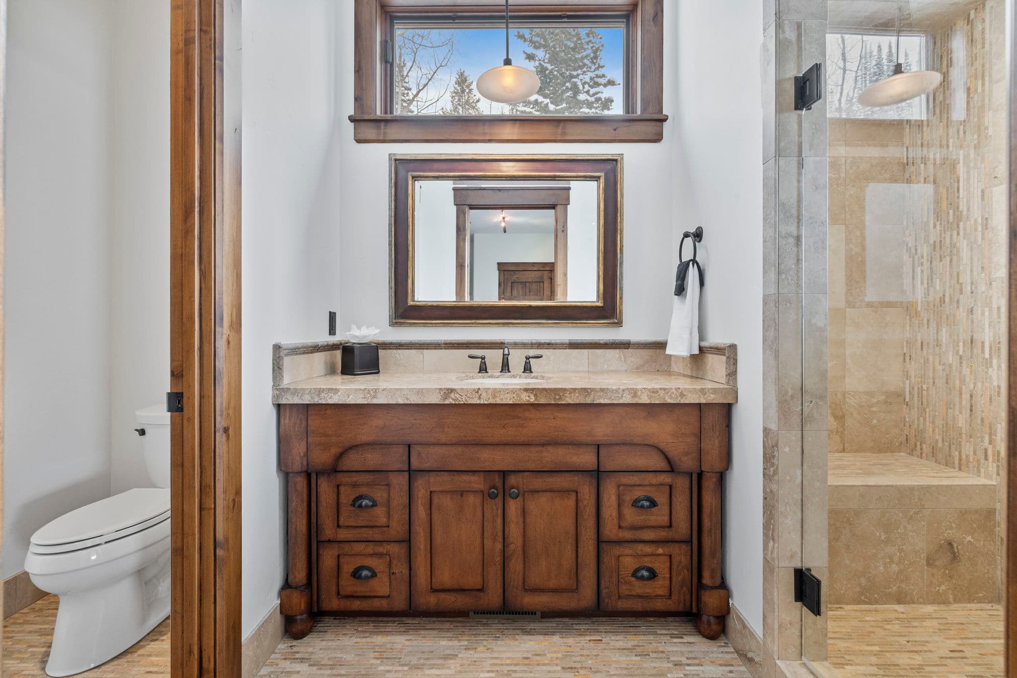 another guest bathroom with large window