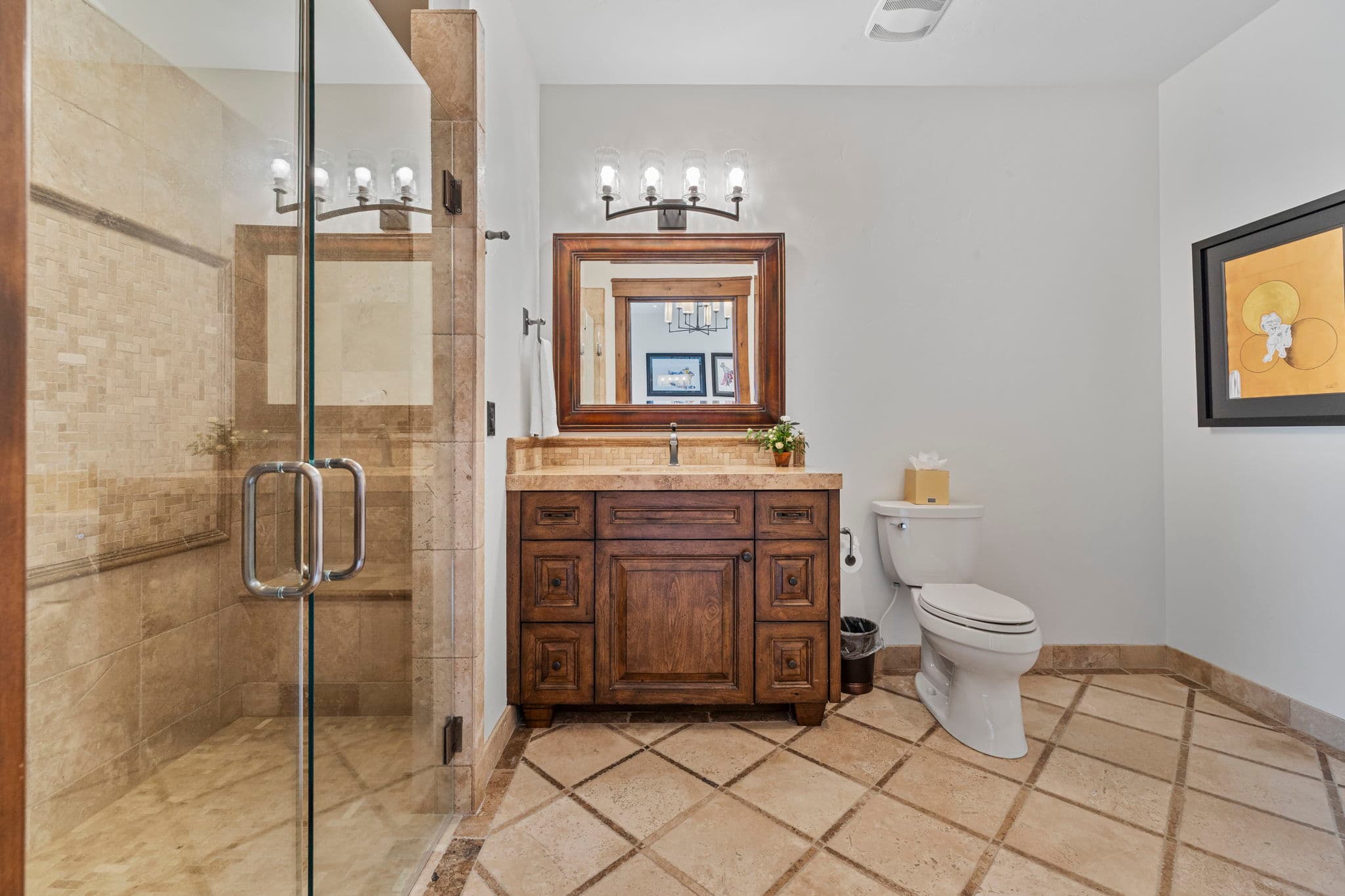 another guest en suite bathroom with shower and vanity