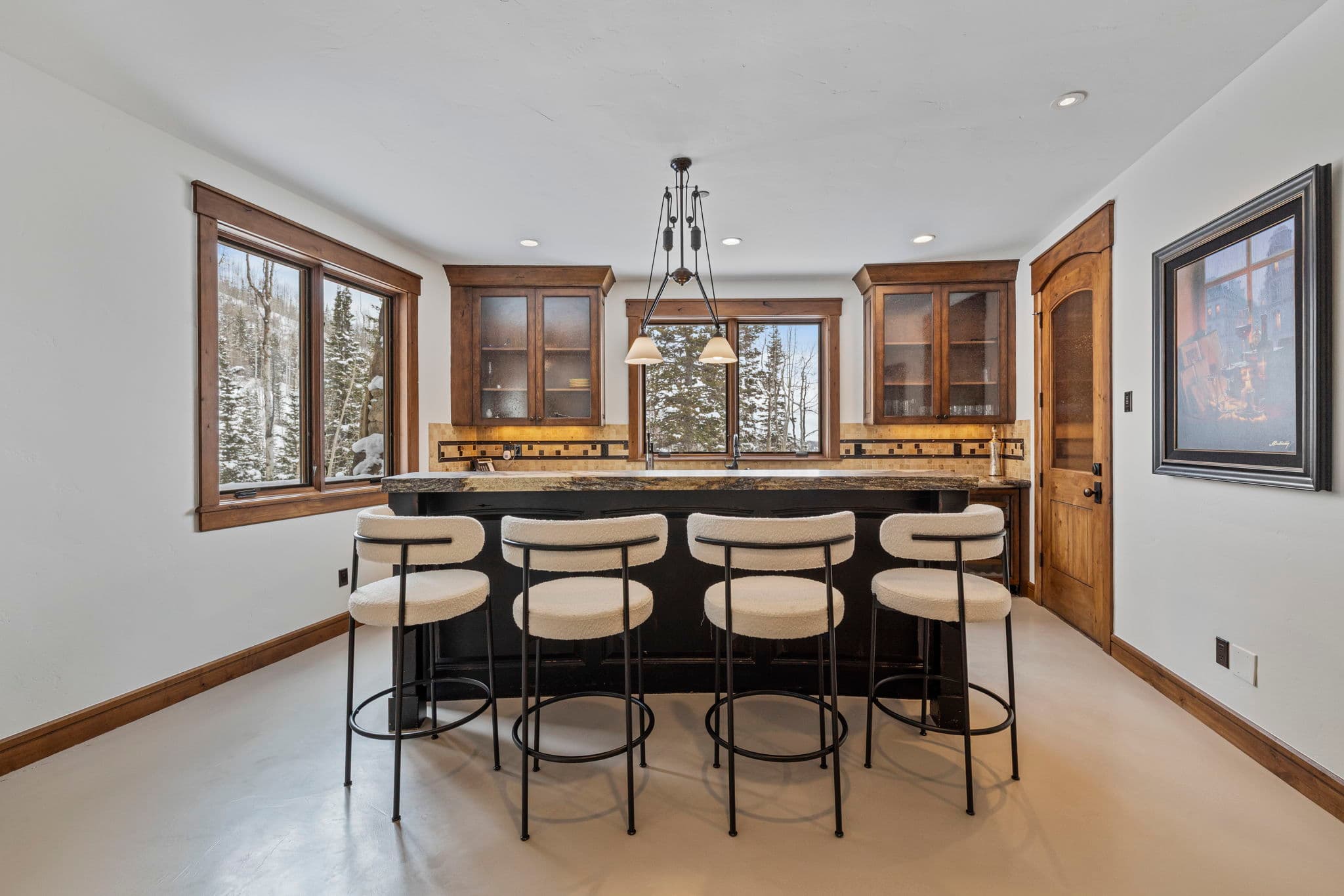 game room bar and view of the ski slopes